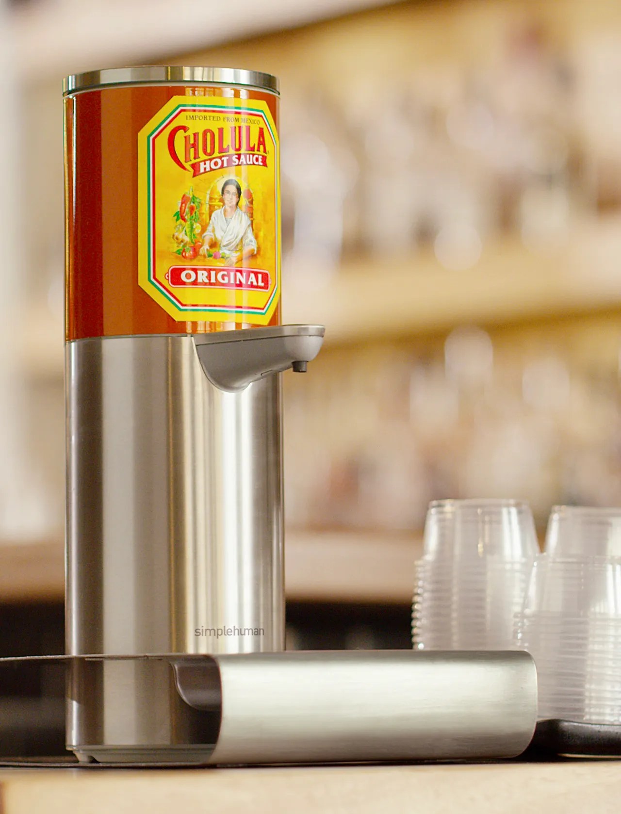 Cholula debuts handsfree hot sauce dispensers for restaurants, people who might need such a