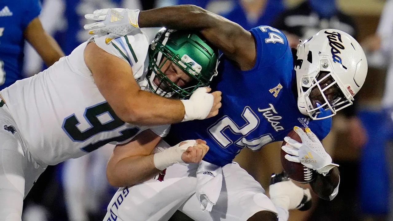 Tulsa gets heroic efforts from thirdstring quarterback, linebacker in