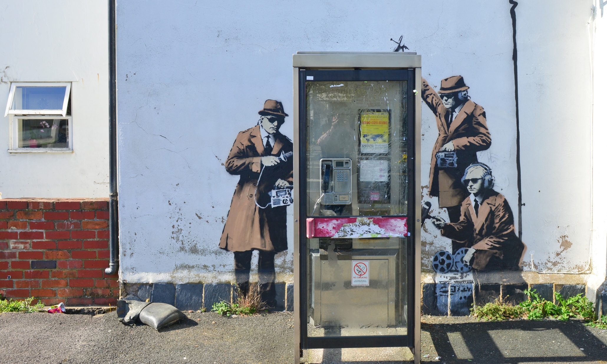 New Banksy? Mural near GCHQ depicts agents listening in on phone box