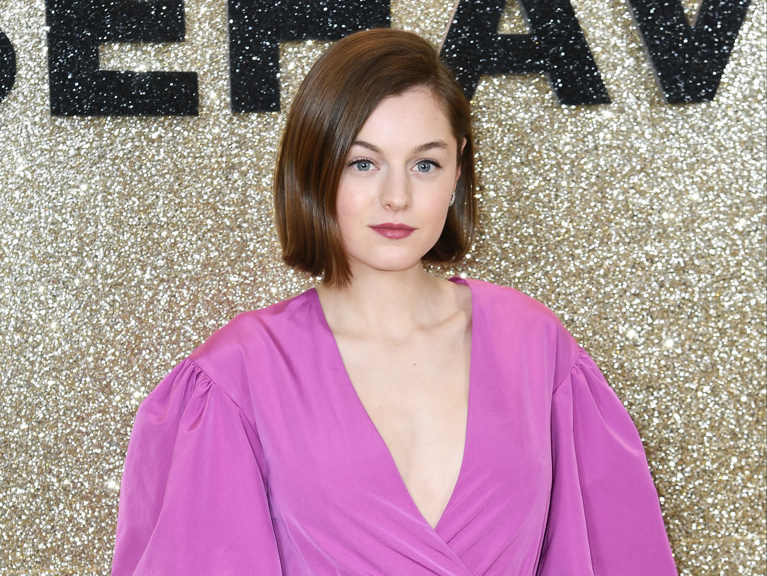 The Crown’s Emma Corrin photographed in chest binder after adopting she