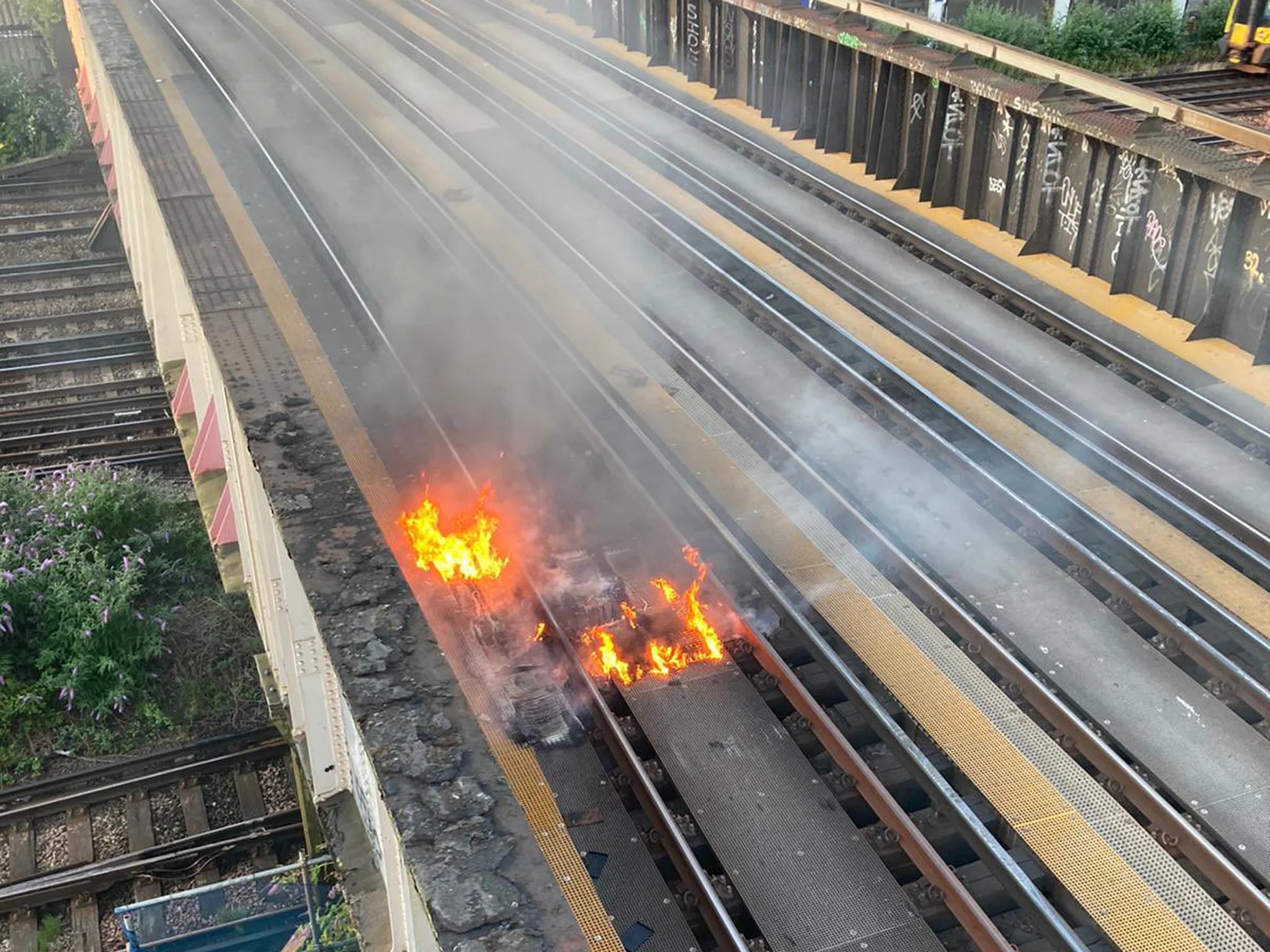 UK heatwave Train tracks catch fire ‘from stray spark’ in 30C as