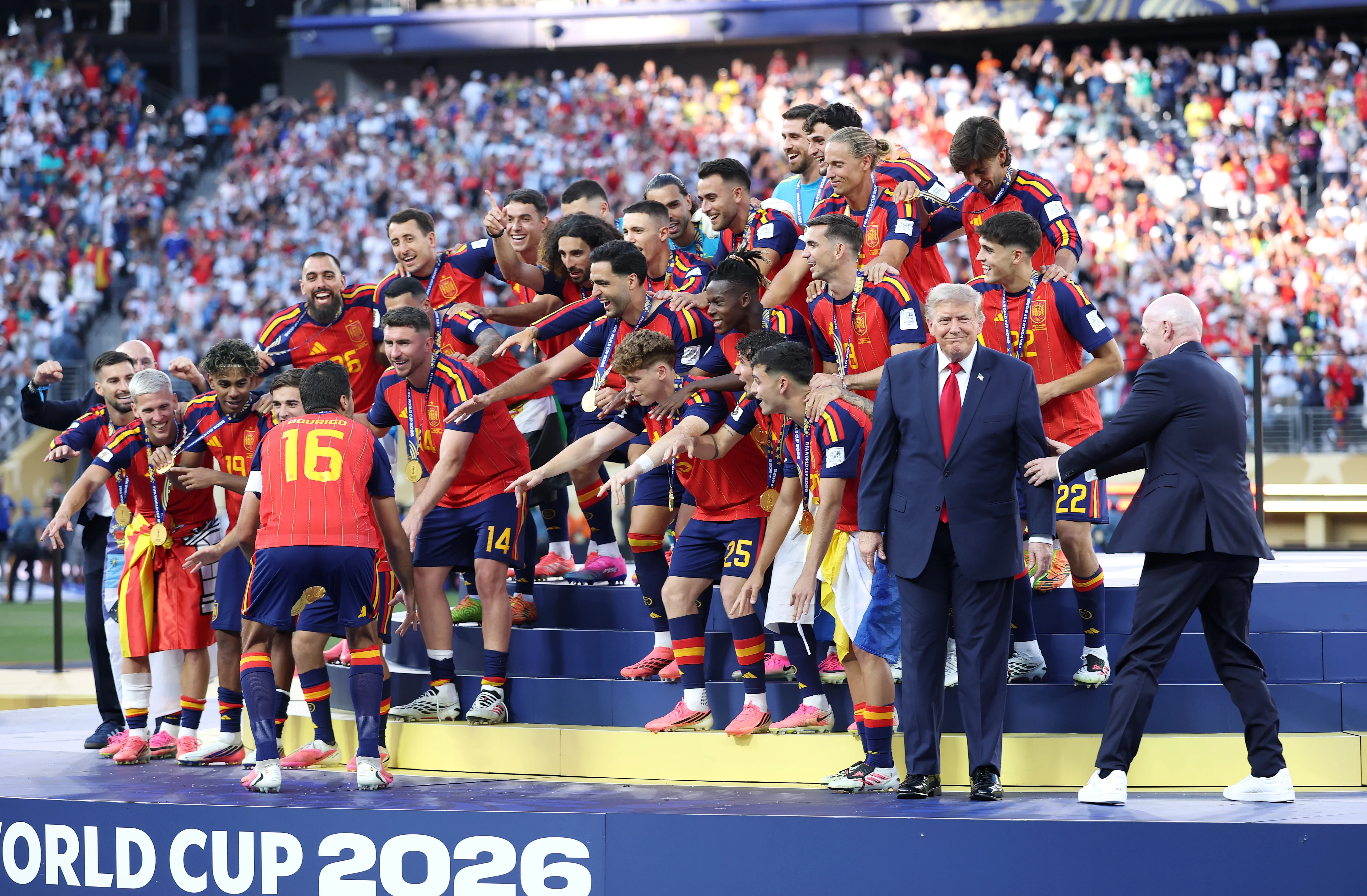 Trump steps all over World Cup winner’s moment as Infantino tries to usher him away from Spain team photo