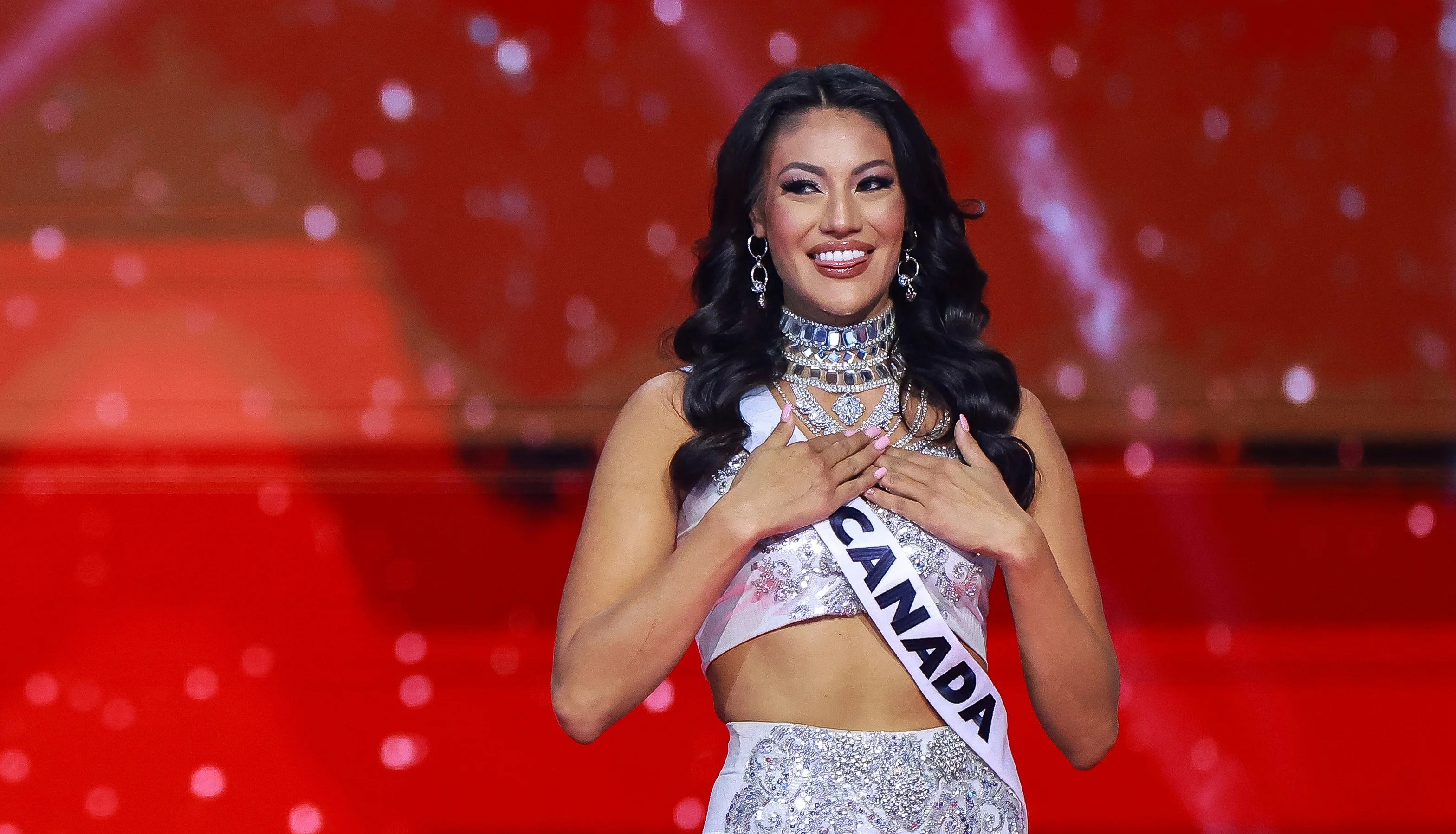 Former Miss Universe Canada stops competition to call out contestant costumes