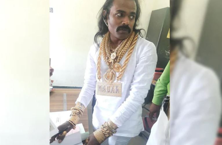 Hari Nadar wearing gold bracelets and heavy necklaces while filing his