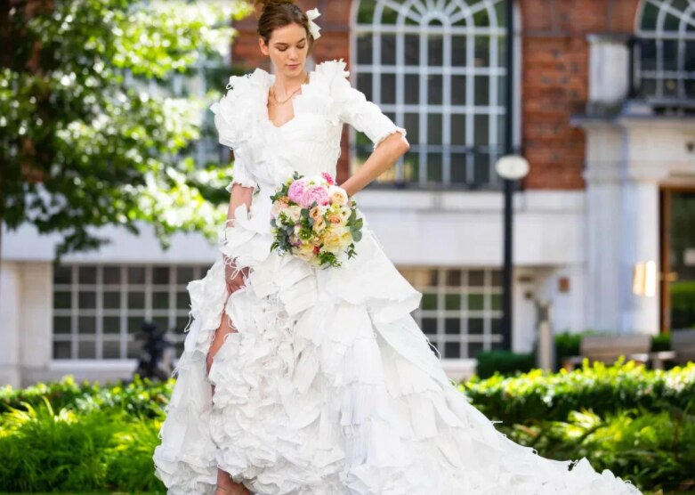 Model Showcases Stunning Wedding Gown Made Entirely of 1500 Discarded