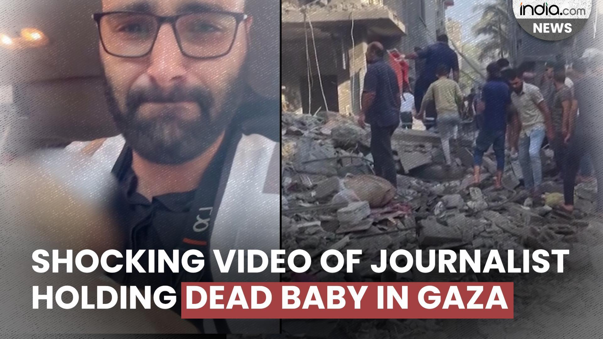 Chilling video of Journalist holding dead baby as Israeli bombardment