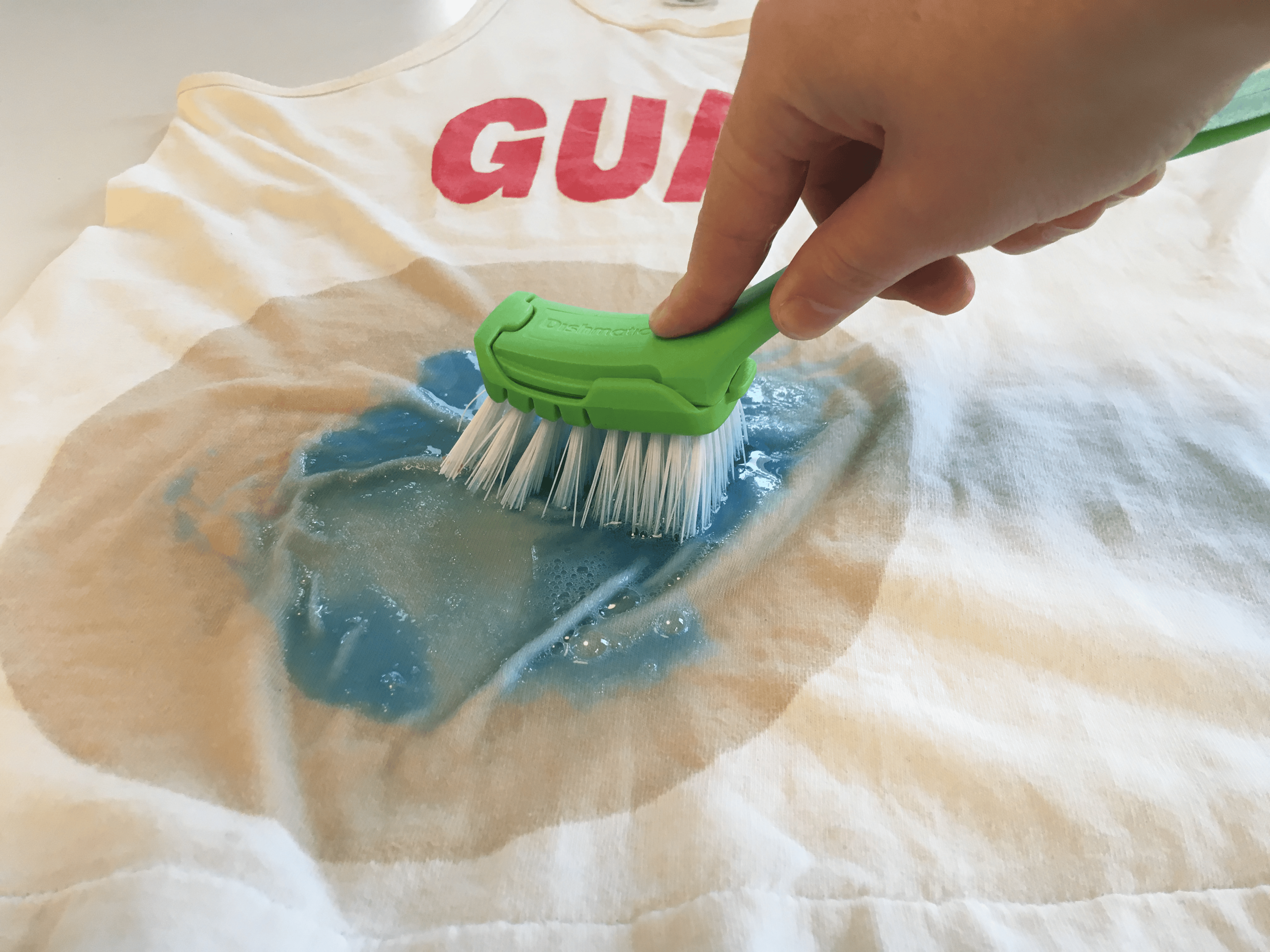 I tried removing stains from a white shirt with Tide and Arm & Hammer