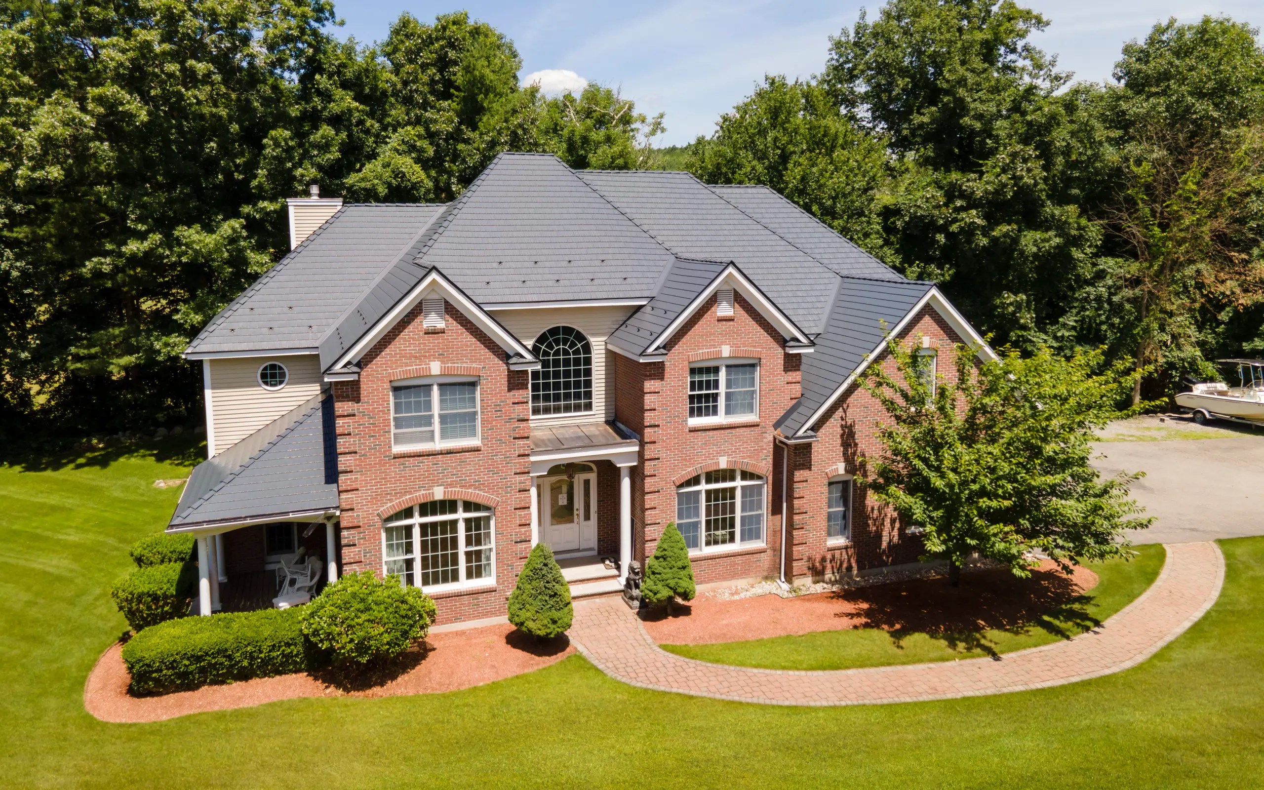 Minimum Roof Pitch for a Metal Roof — 3/12 Minimum Slope