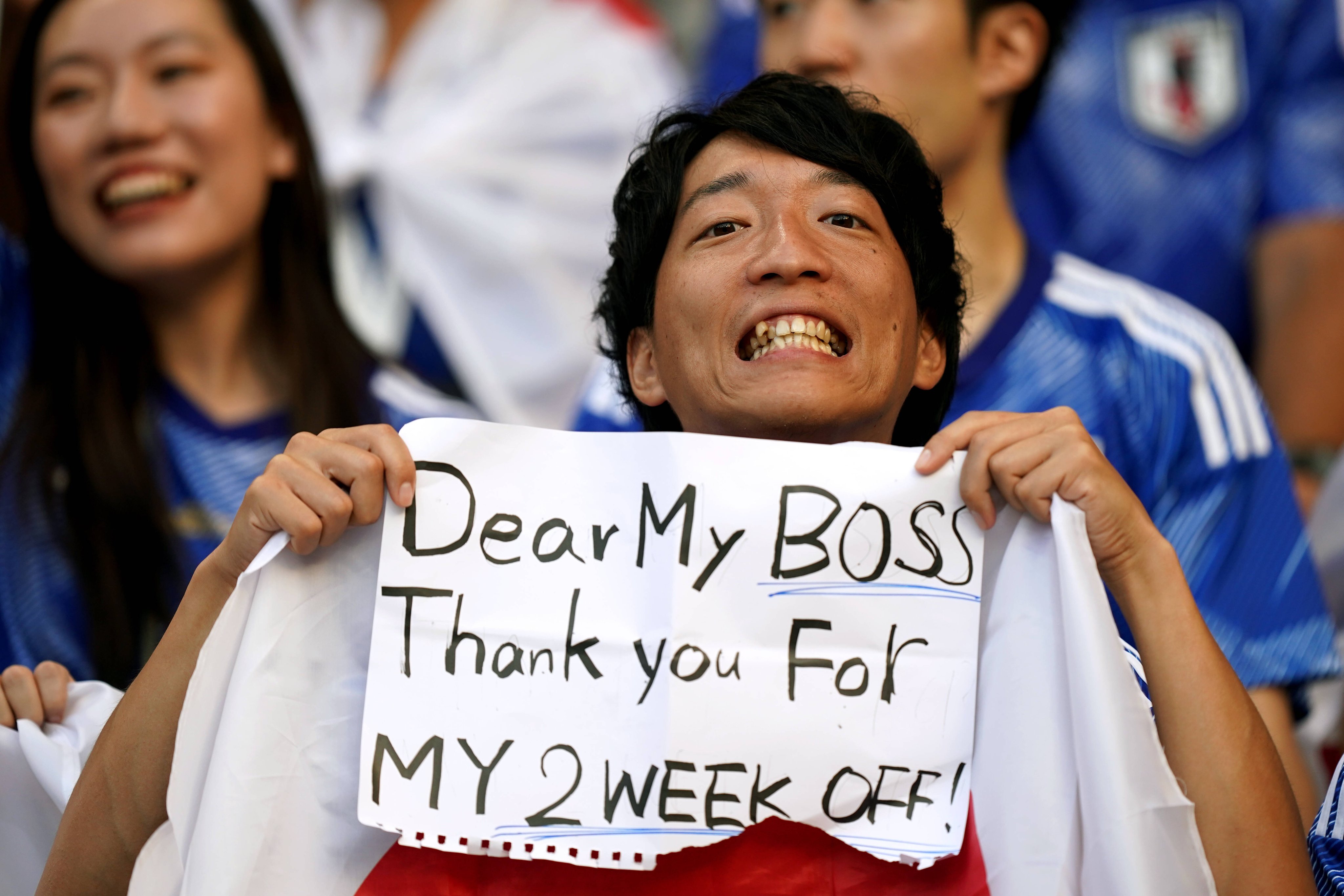 Japanese fan goes viral after holding up sign to thank boss for granting him 2 weeks off to