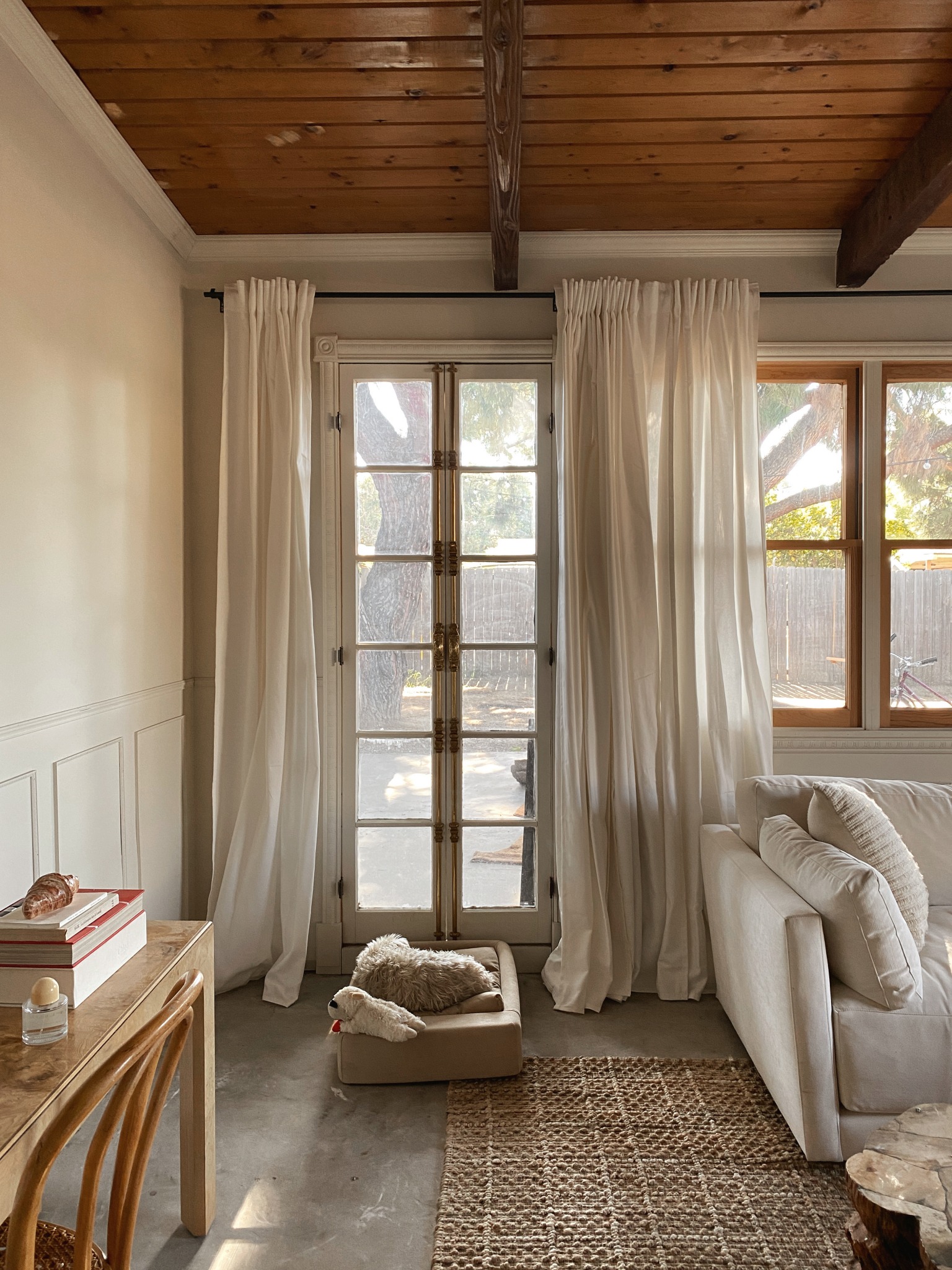 Creating a Wall of Curtains on a Budget Pretty Little Fawn