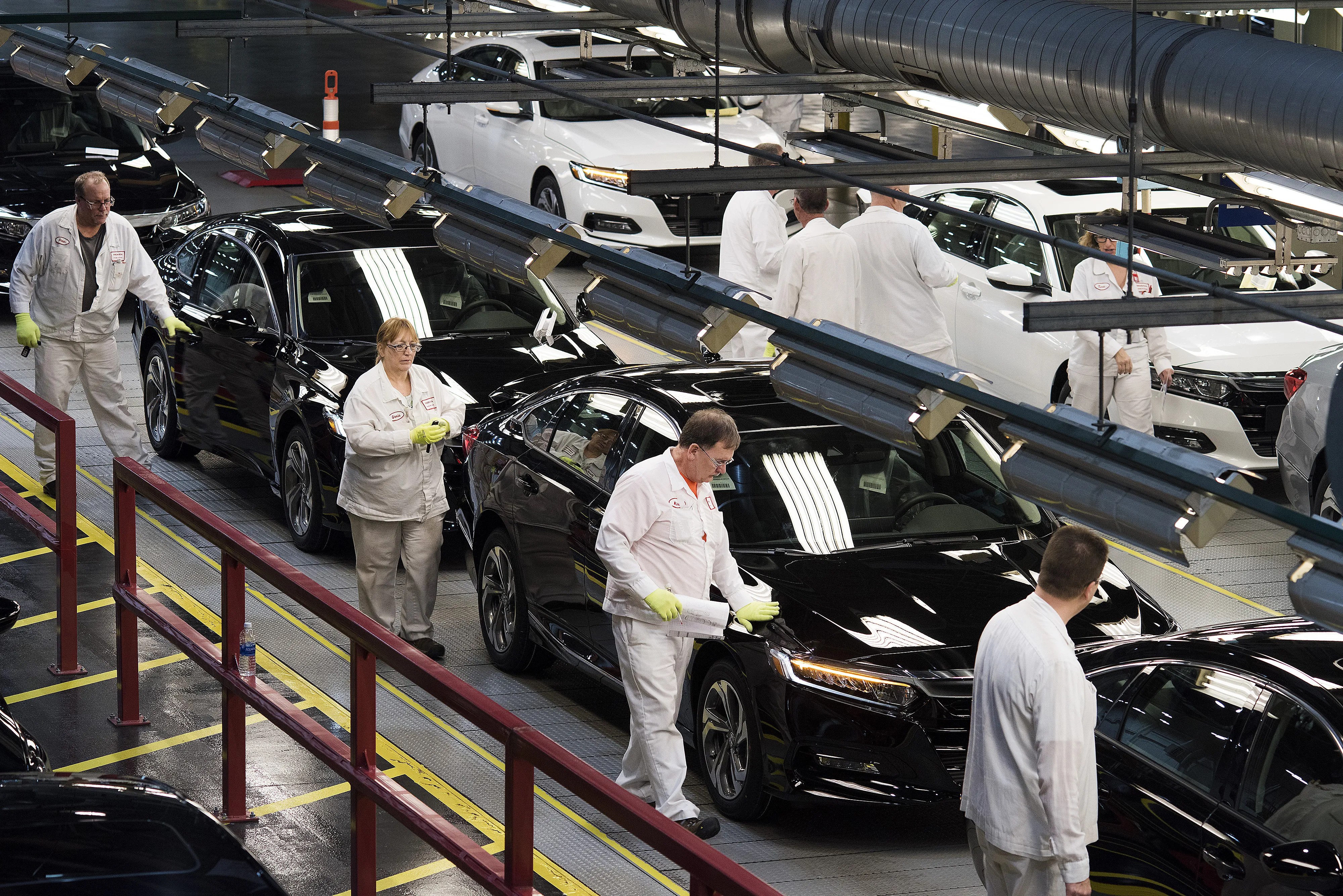 Robots take a back seat as humans build the best new car you can buy