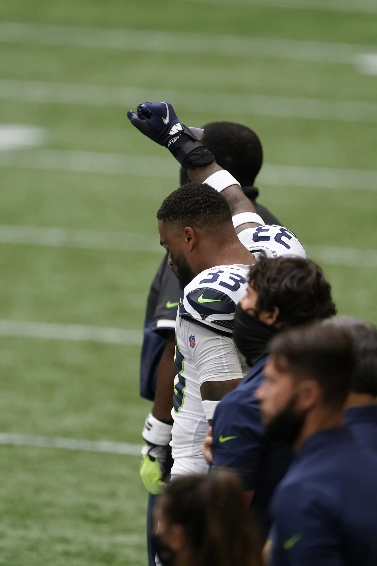 All 22 Seahawks and Falcons players take a knee during the opening