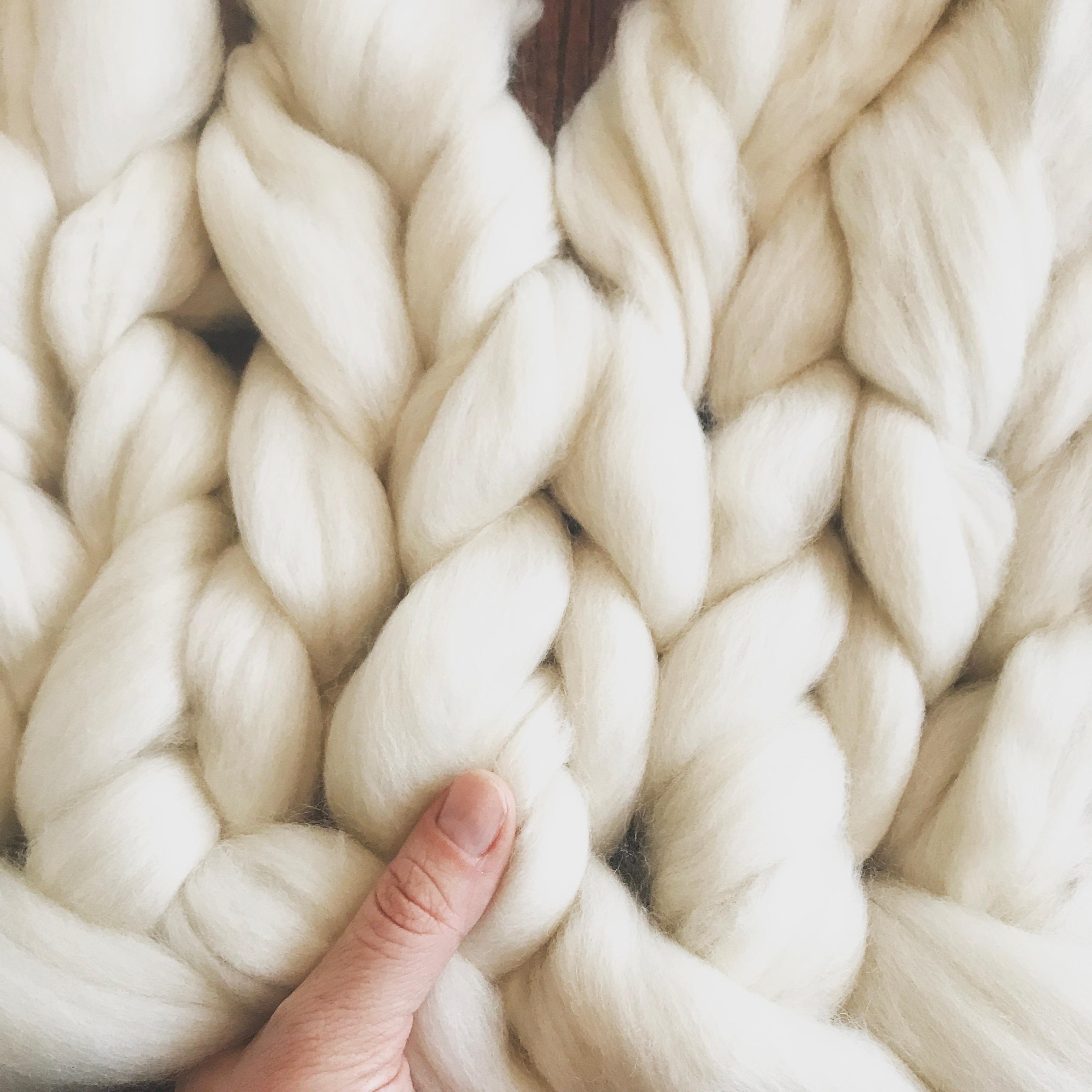 Knit a giant blanket, source wool and make your own huge needles Cara