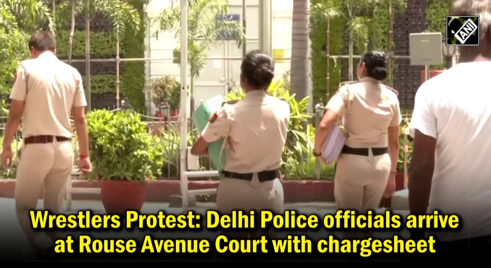 Delhi Police officials arrive at Rouse Avenue Court with chargesheet