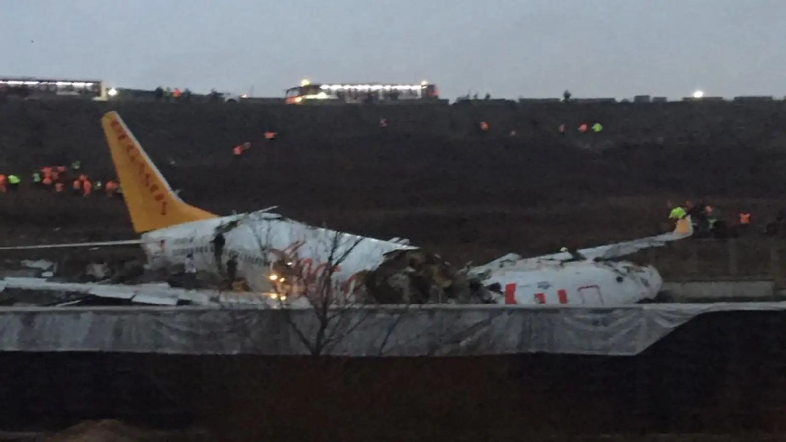 Plane breaks apart after skidding off runway in Istanbul, dozens injured