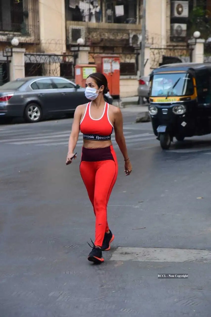 SPOTTED Malaika Arora gives major fitness goals as she steps out in her flaming red gym wear