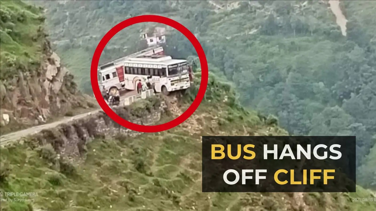 Watch Bus hangs off cliff edge, driver gets passengers to safety
