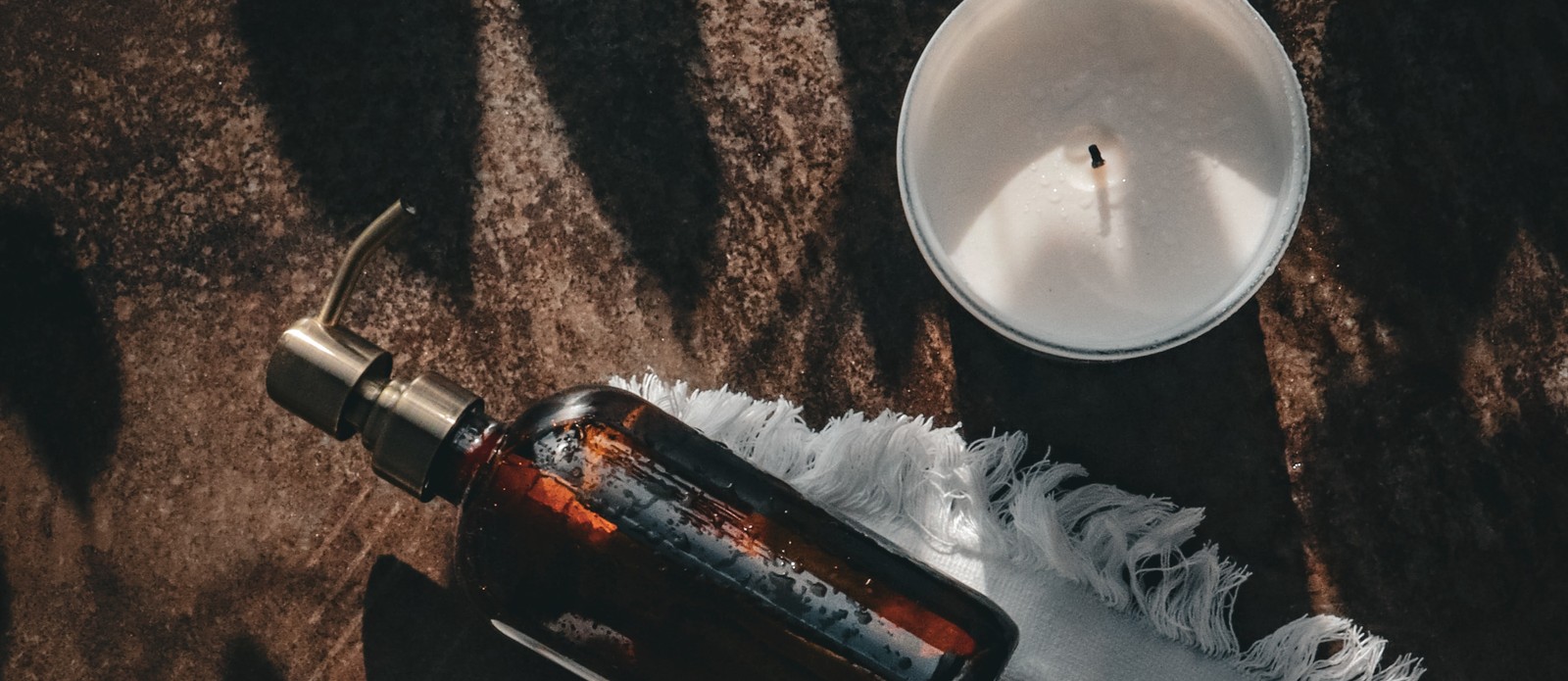 What's the name of processed animal fat used to make soap and candles?