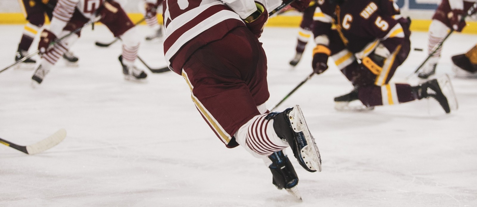 In hockey, what is the name of the zone between the two blue lines?