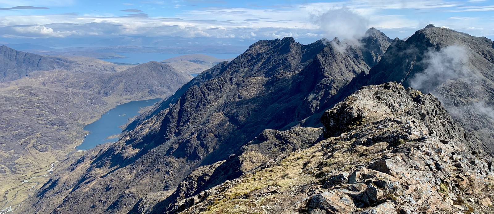 A Munro is a Scottish mountain which is over how many feet high?