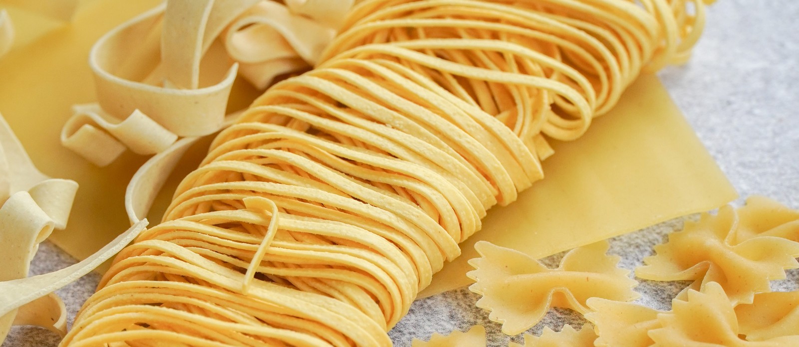 The name of what type of pasta means "little ears"?