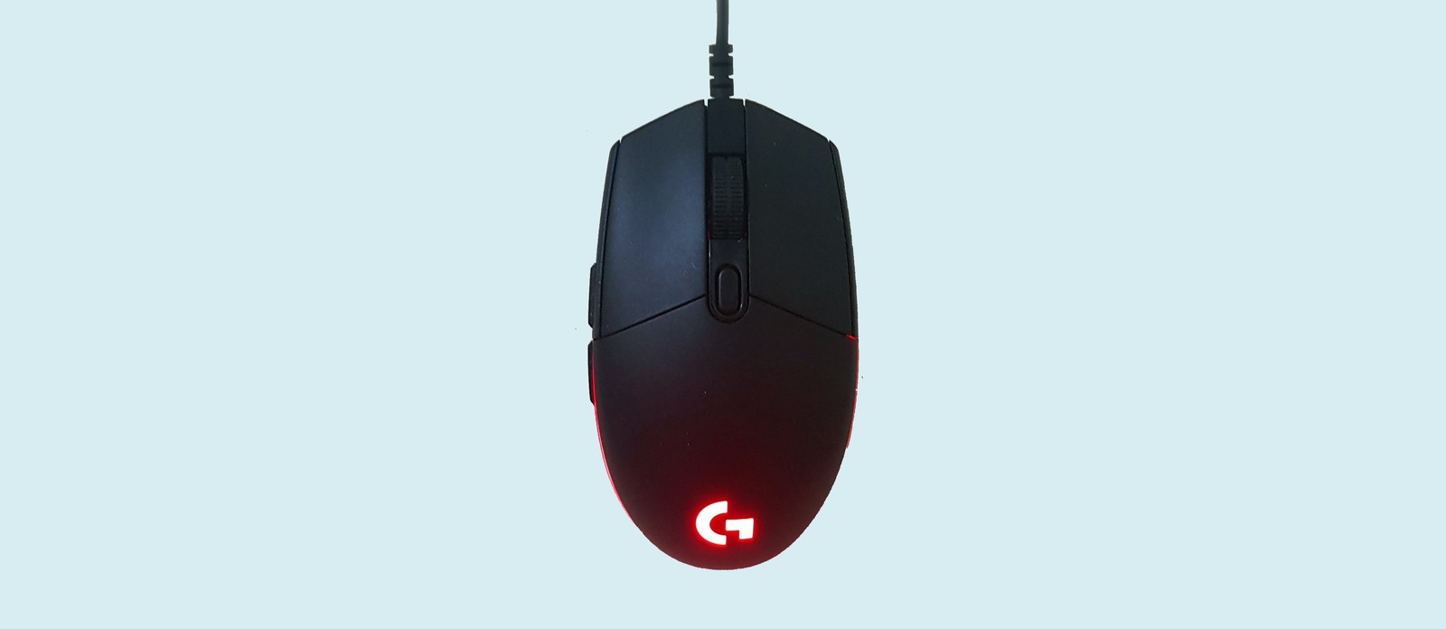 What material was the first computer mouse made of?