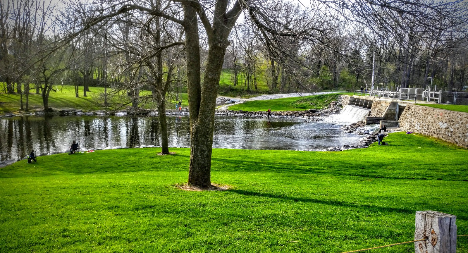 What is the postal state abbreviation of Wisconsin?