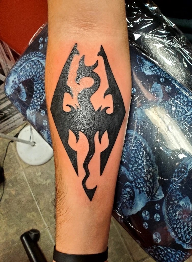 2nd tattoo, got the Skyrim logo Fandom