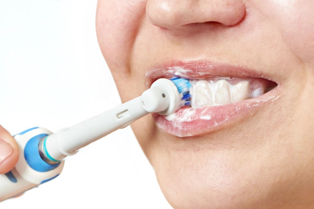 The Benefits of Using an Electric Toothbrush and Proper Techniques