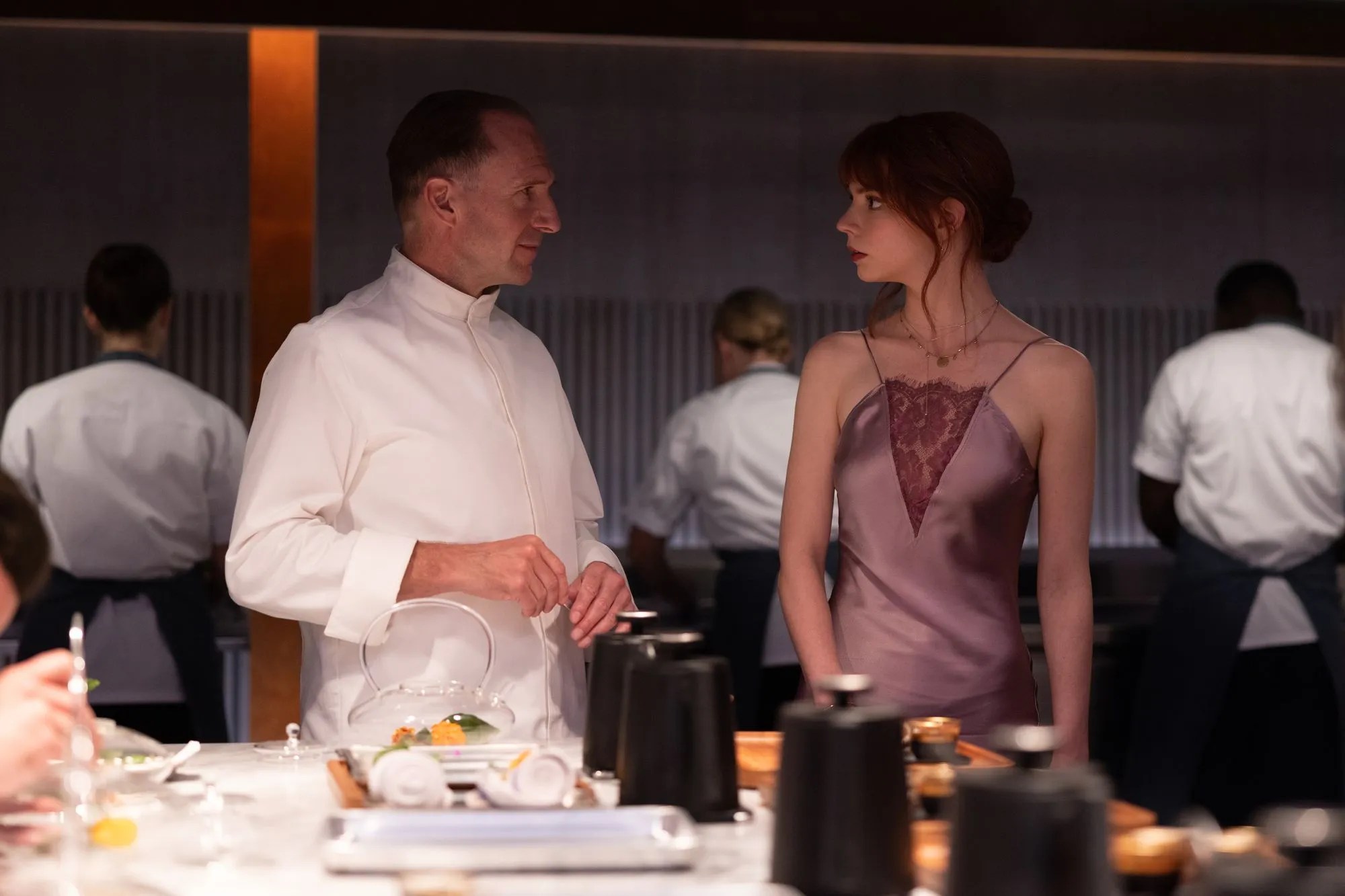 Ralph Fiennes and Anya Taylor-Joy in The Menu