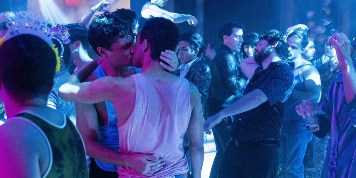 An image from Midnight Kiss showing Cameron (Augustus Prew) and Dante (Adam Faison) kissing in a club.