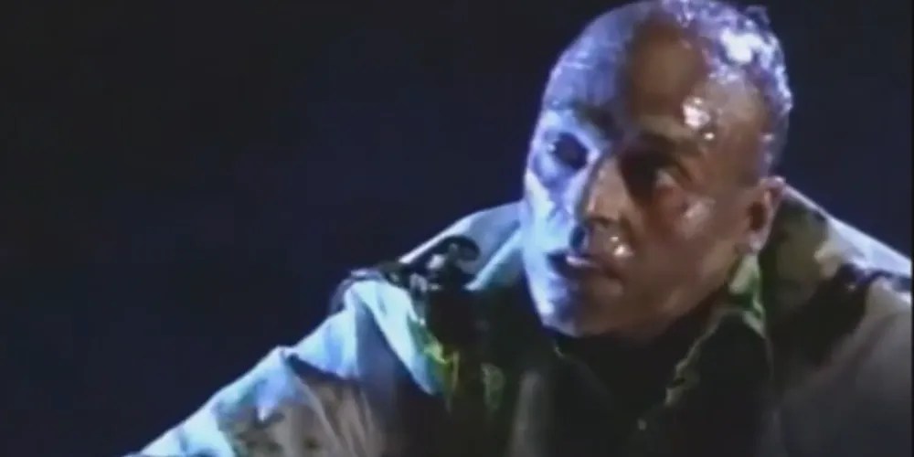 Water zombie with blue moonlight coloring his right side wearing dress-suit.