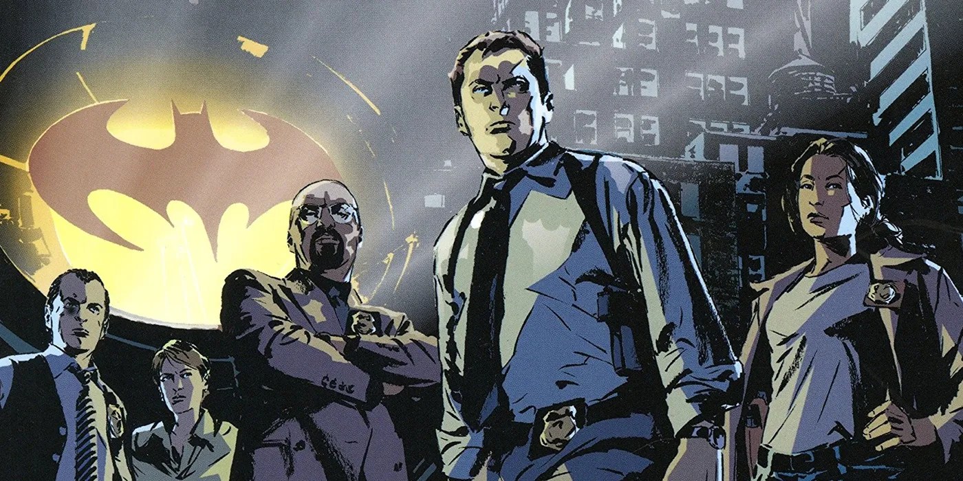 The cast of Gotham Central in front of the Bat-Signal