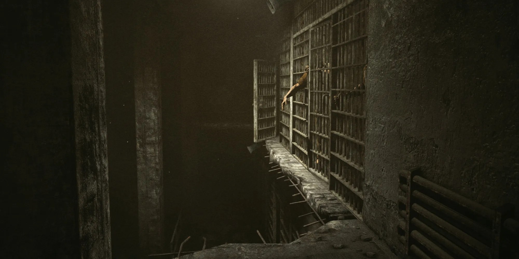 outlast, prison cells, hole in ground, someone reaching out