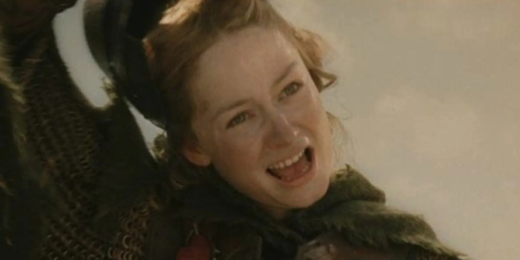 Eowyn removing helmet