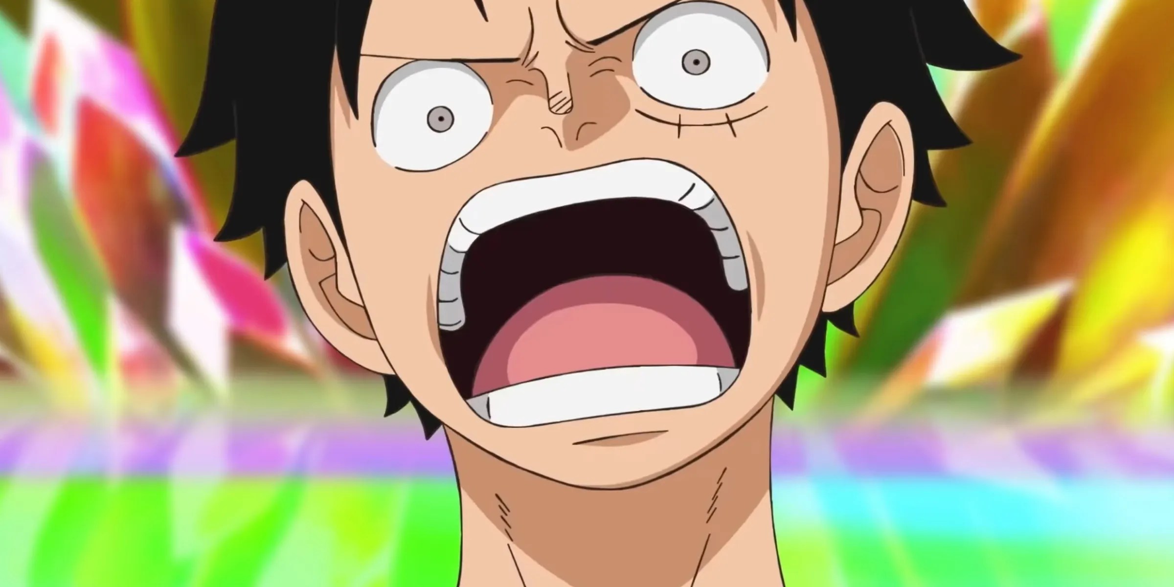 One Piece&rsquo;s Luffy shouting in shock with teeth bared
