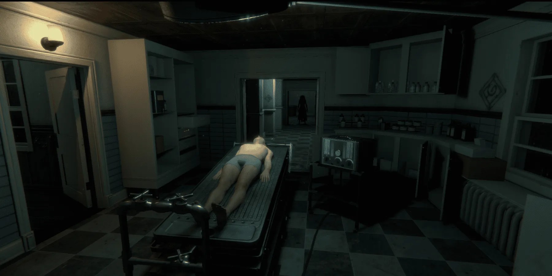 The Mortuary Assistant with a shadowy figure at the end of the hall
