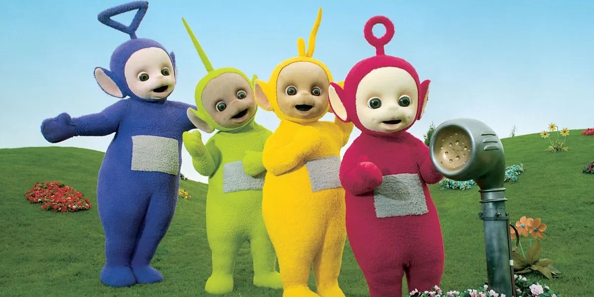 All four Teletubbies talking to a speaker in the original series