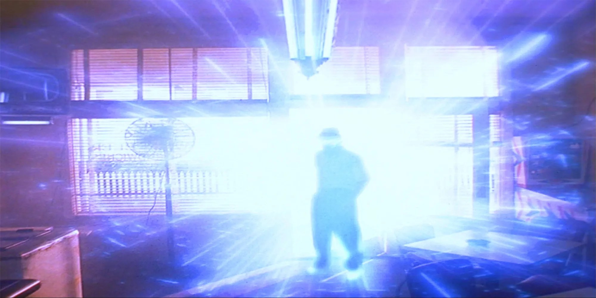 Sam, surrounded by blue light and electricity, leaps into a 1950s bar