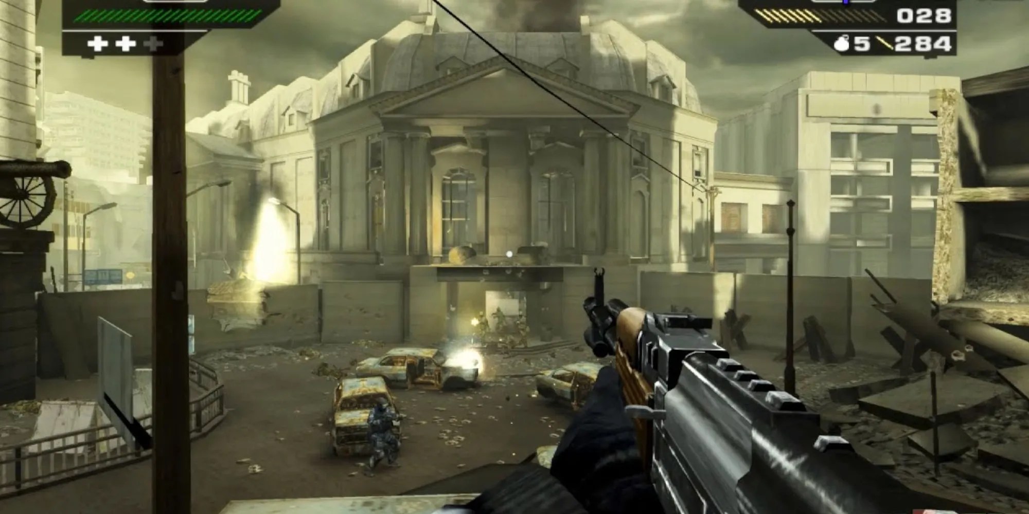 Player aims AK-47 at a building