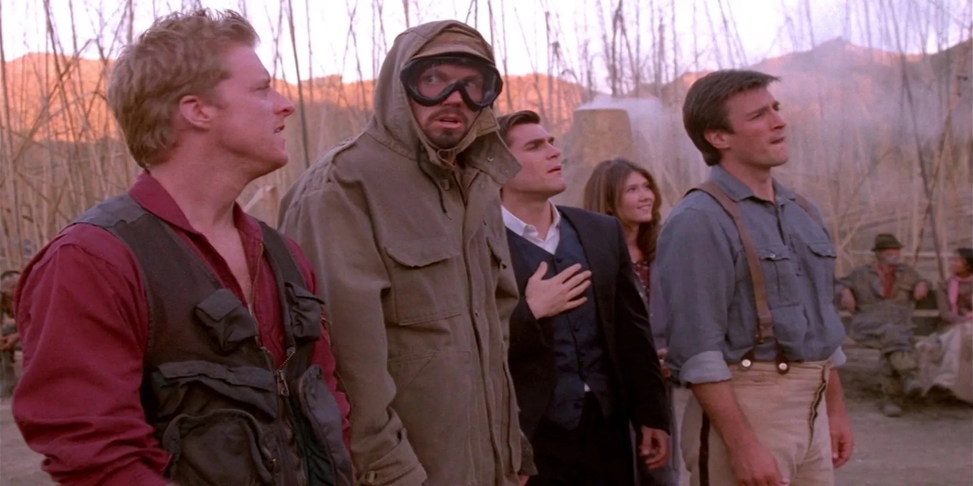 The crew of Serenity stare in awe at a statue of Jayne