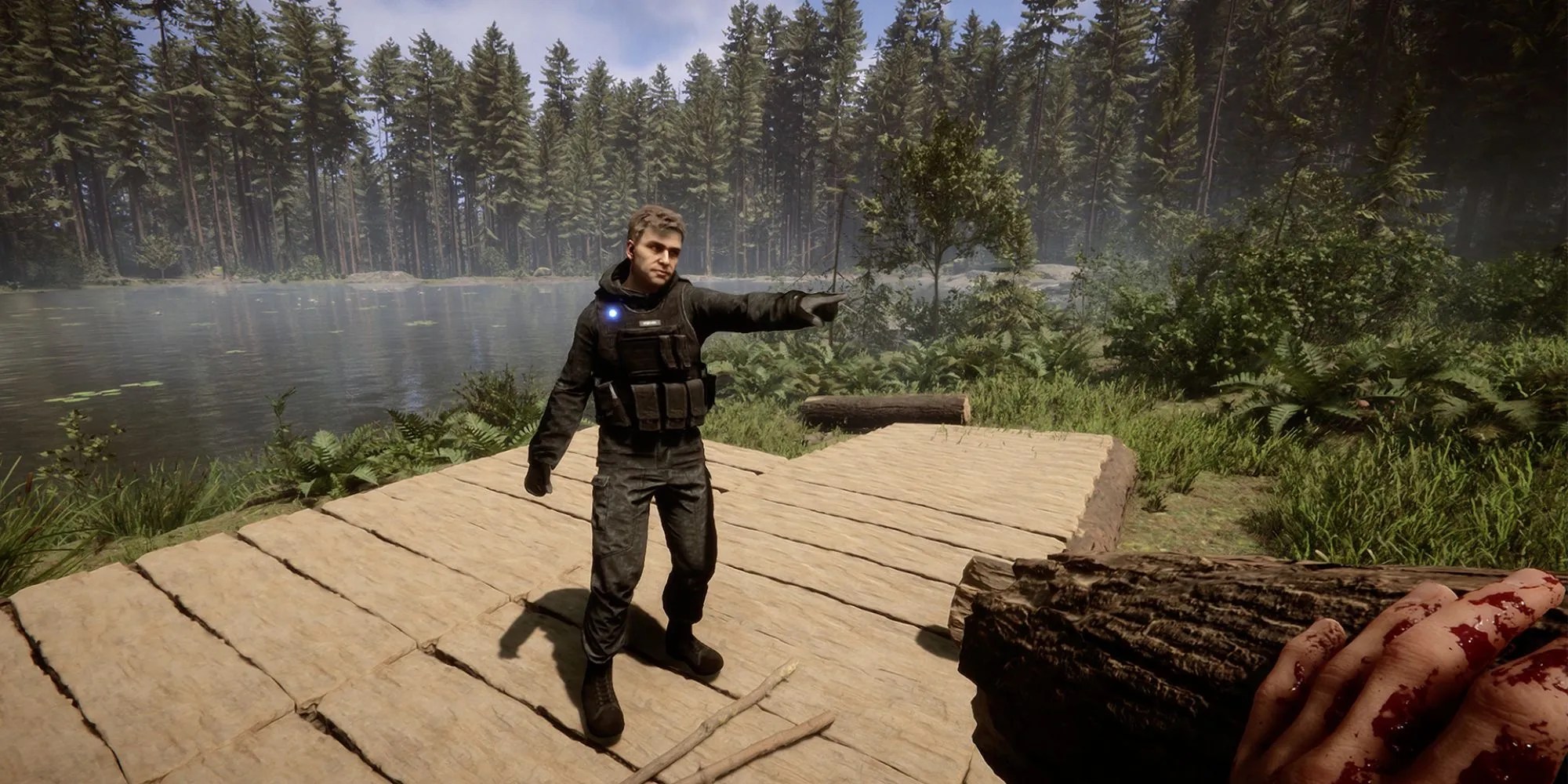 Boy Standing Near A Large Lake Surrounded By Trees In The Sons Of The Forest
