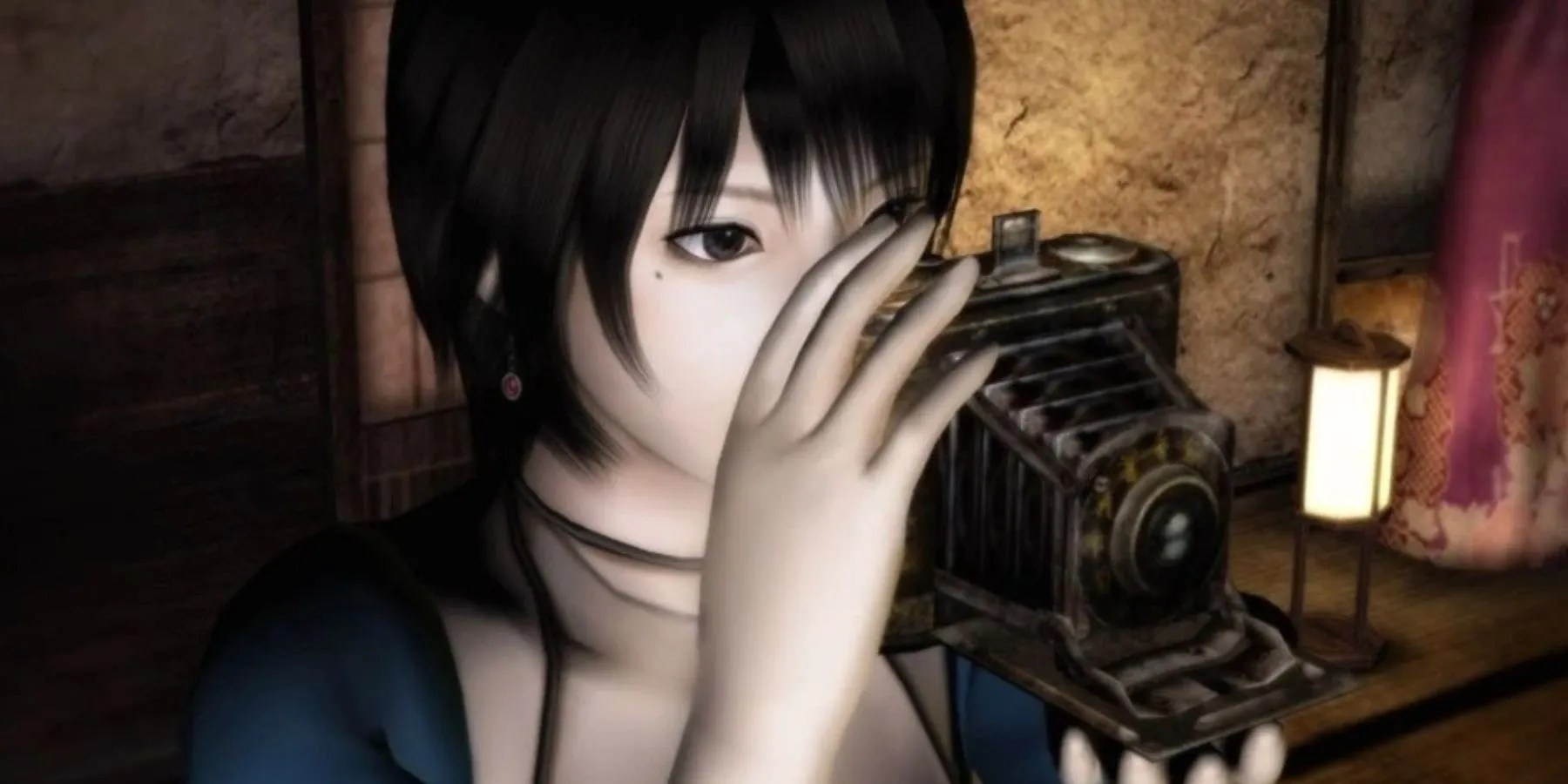 Rei Kurosawa from Fatal Frame 3 holding the Camera Obscura to her eye and taking a picture.