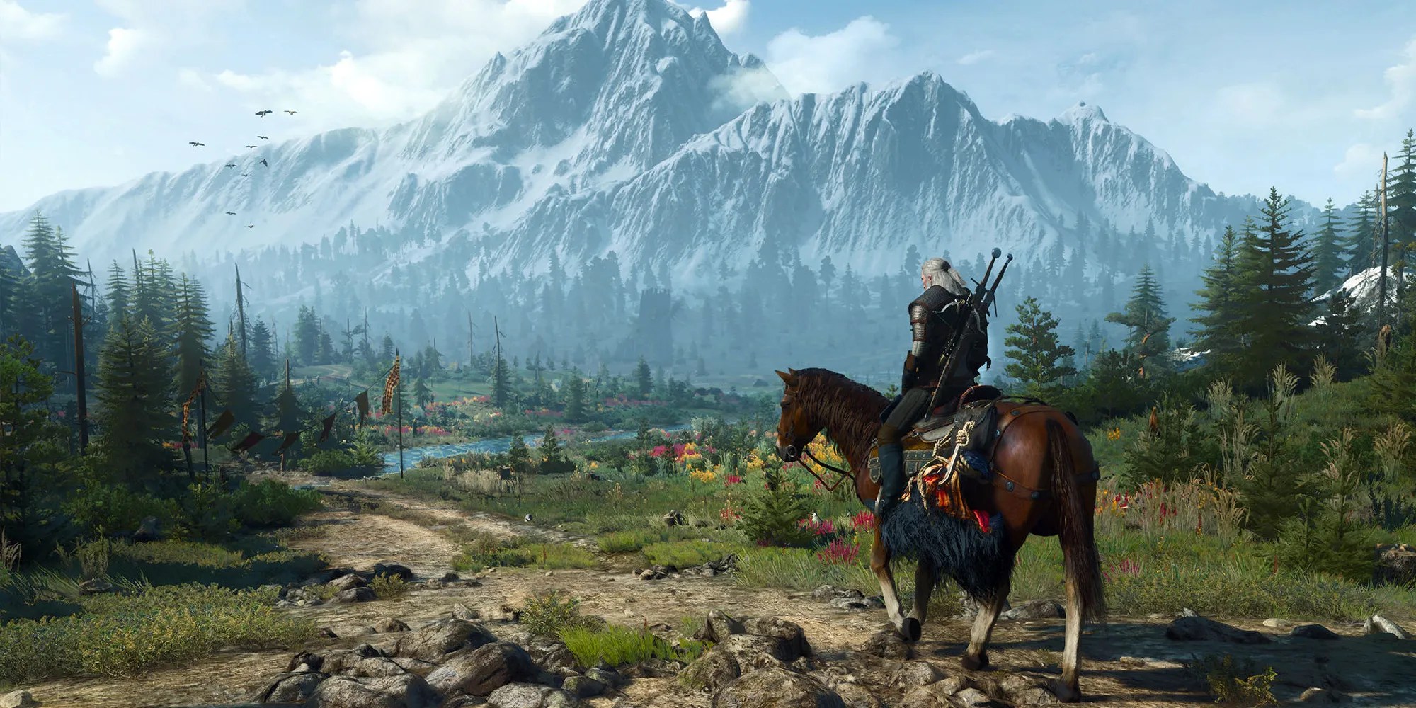 Geralt sat on Roach as he overlooks a beautiful expanse of trees, fields, ponds and distant mountains in The Witcher 3: Wild Hunt