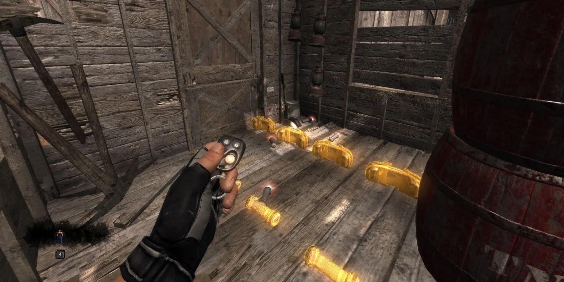 Duke holding his car keys/detonator near some pipe bombs and glowing items in a shed