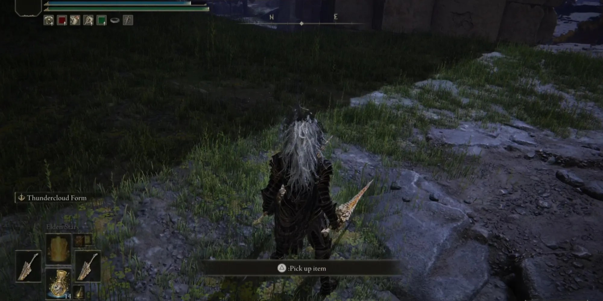 Picking up an item from a corpse in Elden Ring