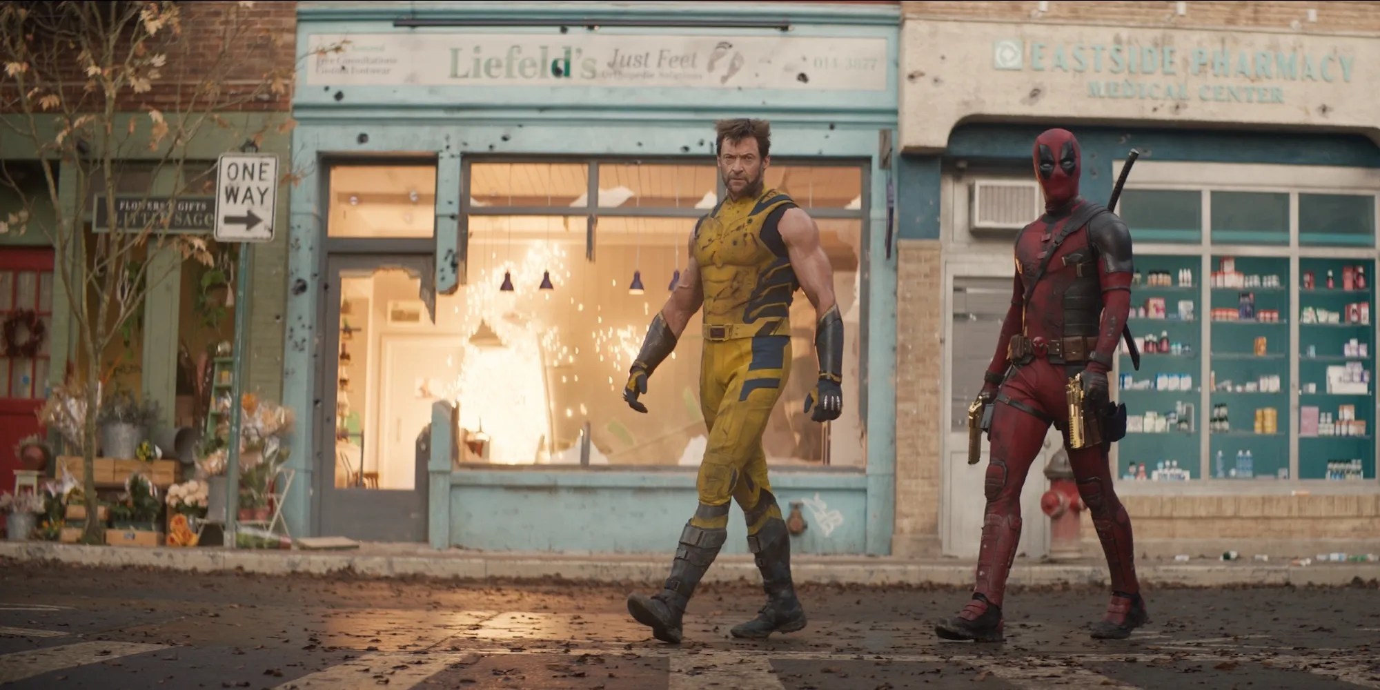 Deadpool &amp; Wolverine Deadpool with Wolverine in front of stores Cropped