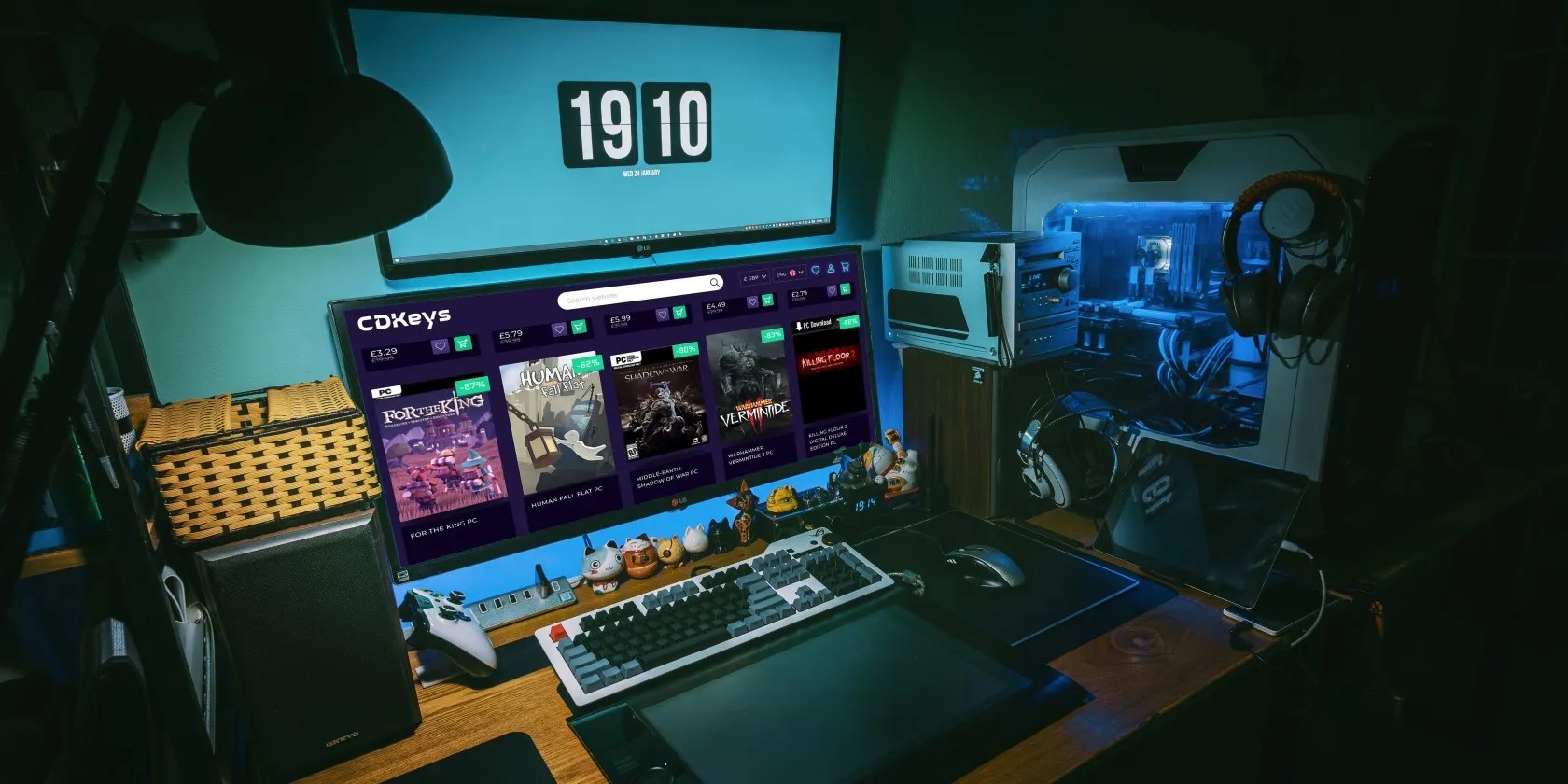 a gaming computer with CD Keys games open on the screen