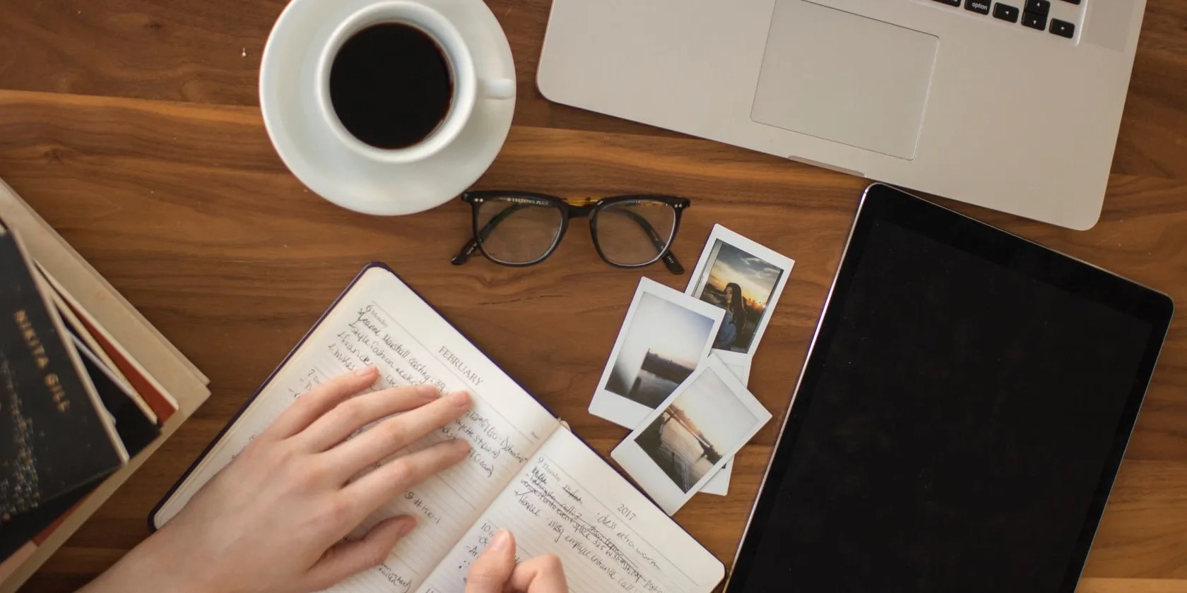 feature image of person taking notes and learning