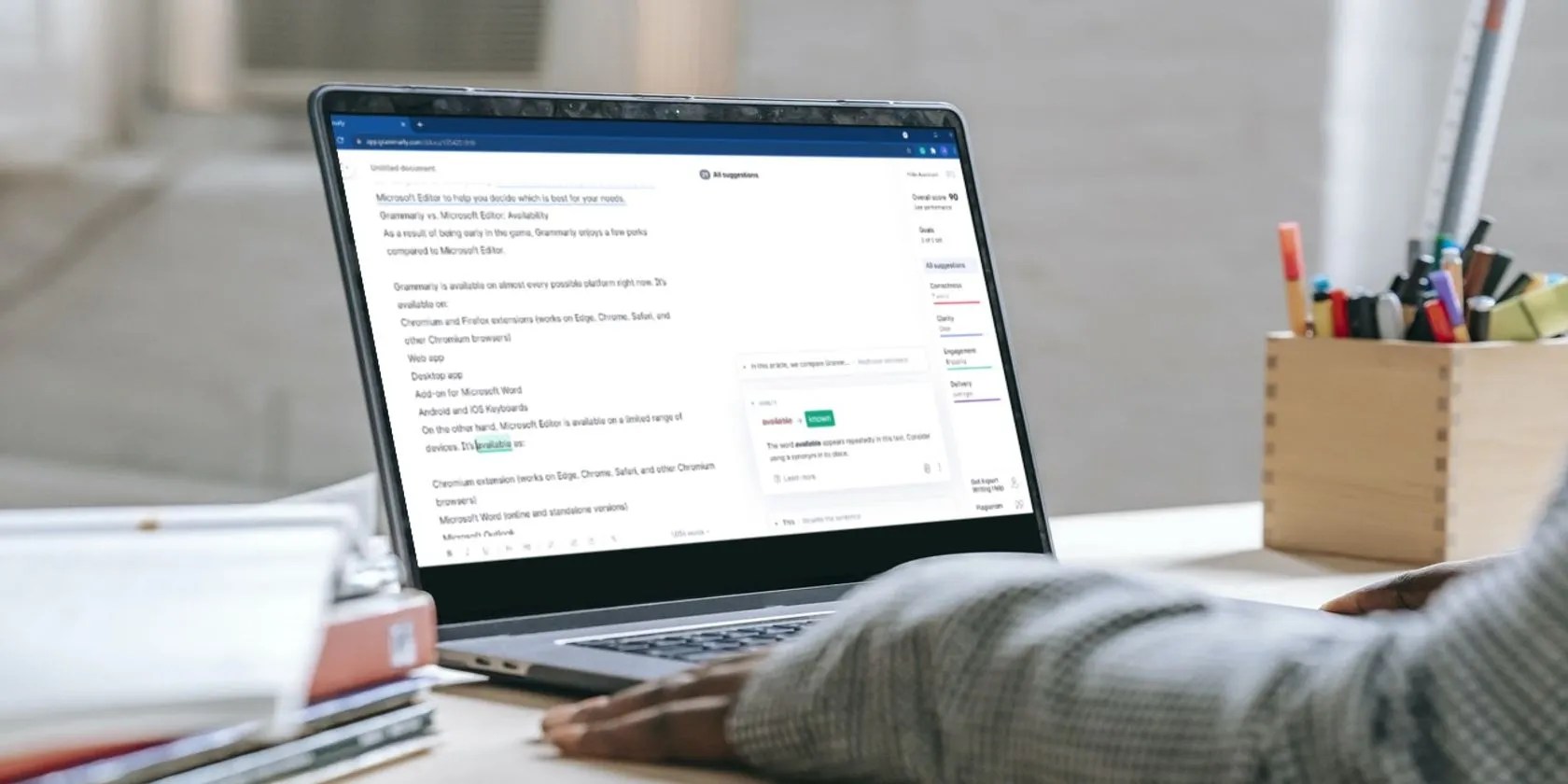 Person using Grammarly on laptop